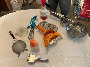 lot 71 image: Lot of Kitchen Tools and Gadgets Including Citrus Juicer, Potato Ricer, and Strainer