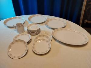 lot 84 image: Dinnerware Items featuring Plates, Bowls, and Mug
