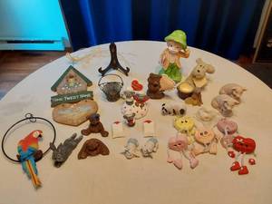 lot 94 image: Assorted Figurine Collection including Heart Characters, Animal Figures, and Valentine Decorations