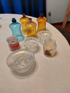 lot 102 image: Glassware Collection including Candle Holders, Clear Bowls, and Decorative Jars