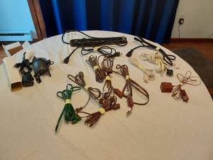 lot 165 image: RCA Surge Protector Power Strip and Assorted Electrical Cords