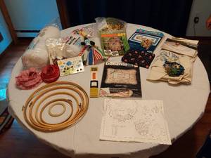 lot 176 image: Craft Supplies Collection including Macrame Animal Art Kit, Embroidery Hoops, and Sunset Needlepoint Kit