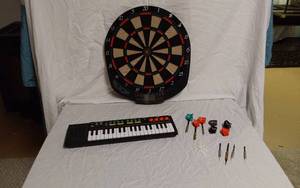 lot 214 image: Electronic Dartboard, Casio SA-39 Keyboard