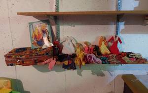 lot 226 image: Barbie and Skipper Dolls and Accessories Lot including Clothes, Malibu Skipper Paper Dolls, and Decorative Suitcase