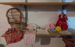 lot 227 image: Doll Accessories and Clothes with Wicker Chair and Beaded Bag