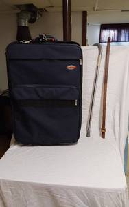 lot 259 image: North Crest Soft-Sided Rolling Luggage with 2 Canes