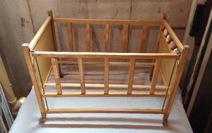 lot 274 image: Vintage Wooden Baby Crib with Baby Deer Sticker and Rolling Wheels