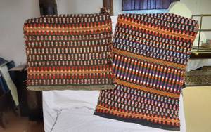 lot 298 image: Handwoven Wool Textile Rugs One is about 66 long the other 67