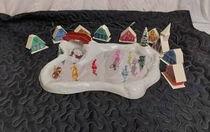 lot 320 image: Vintage Christmas Village Set with Ice Skating Rink