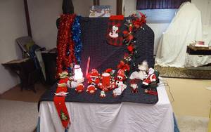 lot 324 image: Christmas Decorations including Stocking, Garland, and Figurines