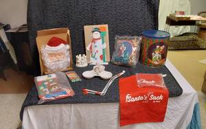 lot 329 image: Vintage Christmas Decorations including Santa Wall Hanging, Snowman Countdown Calendar, and Assorted Holiday Items