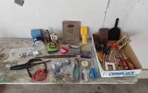 lot 380 image: Ford Model A Instruction Book and Various Tools and Supplies Including Stanley 25 LeverLock Tape Measure and Accessories