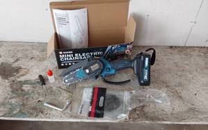 lot 390 image: Saker Mini Electric Chainsaw 20V - Missing Charger