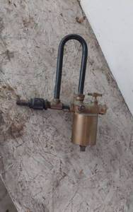 lot 402 image: Swift Lubricator Co. Brass Oiler