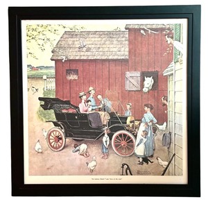 lot 84 image: Norman Rockwell Framed Print, The Famous Model T was Boss of the Road