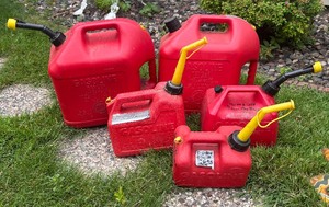 lot 278 image: Five 1, 1.5 and 5 Gallon Gas Cans