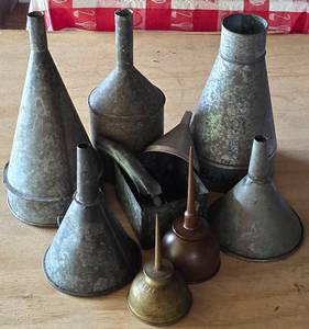 lot 361 image: Collection of Vintage Metal Oil Funnels, Oil Cans, & More