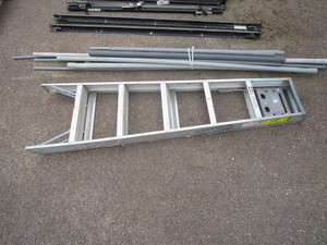 lot 23 image: 6 Alum Step Ladder & Misc PVC Pipe