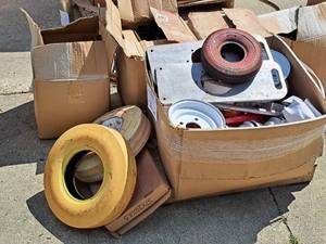 lot 128 image: Lot of (1 Pallet) Assorted Pitching Machine Parts and Rims  Wheels