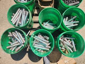 lot 47 image: Lot of (7 Pails) Machining Parts for Pitching Machine Assemblies