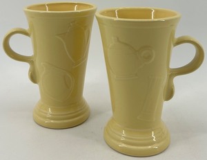 lot 305 image: Set of 2 Sunshine Yellow Fiesta Ware Ceramic Mugs with Embossed Design