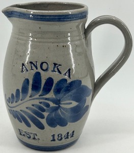 lot 85 image: Handcrafted Anoka Stoneware Water Pitcher Est. 1844 with Blue Floral Design