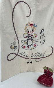 lot 89 image: Vintage Laundry Bag and Anthropomorphic Strawberry ceramic dish
