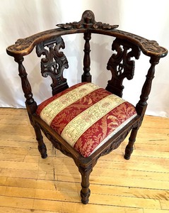 lot 36 image: Antique Carved Wood Corner Chair with Decorative Upholstered Seat