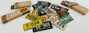 lot 150 image: Collection of Vintage Mini Bicycle License Plates from Various States and Years