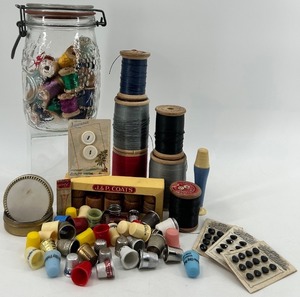 lot 179 image: Vintage Sewing Collection with Spools, Thimbles, and Buttons
