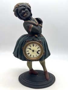 lot 10 image: Antique Bradley Hubbard Winking Clock Figure