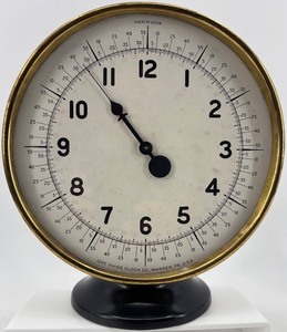 lot 312 image: Vintage One Hand Clock Co. Clock with Brass Detailing