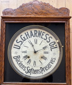 lot 367 image: Antique U.S.G. Harness Oil Advertising Wall Clock