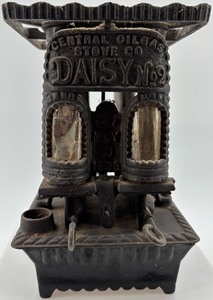 lot 401 image: Antique Daisy No. 2 Cast Iron Oil Gas Stove by Central Oil & Gas Stove Co.