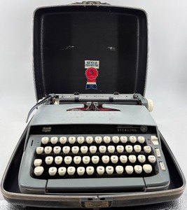 lot 403 image: Smith-Corona Sterling Typewriter with Case