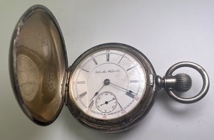 lot 432 image: Hamilton Watch Co. 17 Jewels Pocket Watch in A.W.W.Co. Silver Coin Case