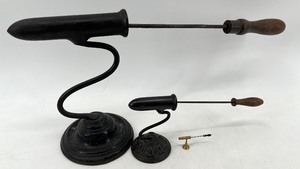 lot 469 image: Collection of 3 Antique Hat Ironing Tipping Irons with Stands