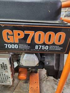 lot 24 image: USED Generac GP7000 Portable Generator with OHV Engine