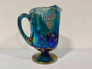 lot 16 image: Iridescent Blue Indiana Carnival Glass Pitcher