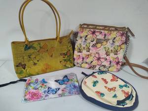 lot 39 image: Butterfly Themed PursesMake-Up Bags