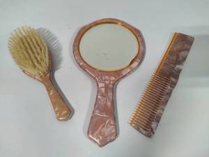 lot 67 image: Vintage Bakelite BrushCombMirror Set
