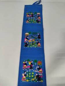 lot 86 image: Hmong Story Cloth Mail Holder