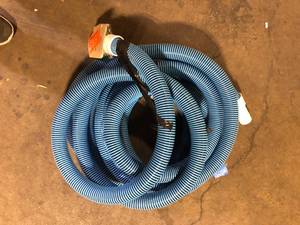 lot 16 image: HDX Spiral-Wound 35 ft. x 1 12 in. Diameter Swimming Pool Vacuum Hose for In-Ground and Above-Ground Pools Customer Returns See Pictures