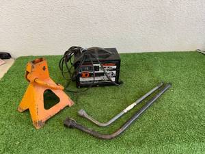 lot 159 image: Battery Charger & Tire Irons