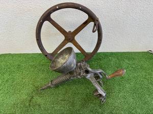 lot 162 image: Vintage Steering Wheel & Meat Grinder
