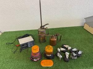 lot 205 image: Oil Cans, Casters, Lights & Battery Charger