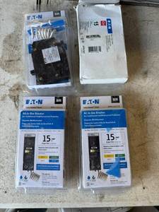 lot 60 image: New Eaton 15Amp Single Pole Breakers