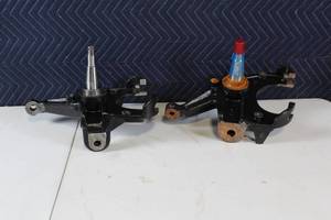 lot 57 image: Pair of Automotive Steering Knuckles LH & RH