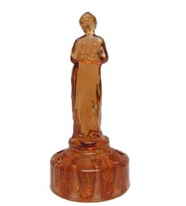 lot 34 image: Excellent Figural Maiden Glass Flower Frog #2 - Amber