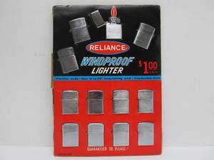 lot 53 image: Fantastic Orig Vintage 1950s-60s era RELIANCE Windproof Lighter Advertising Store Display Sign wLighters